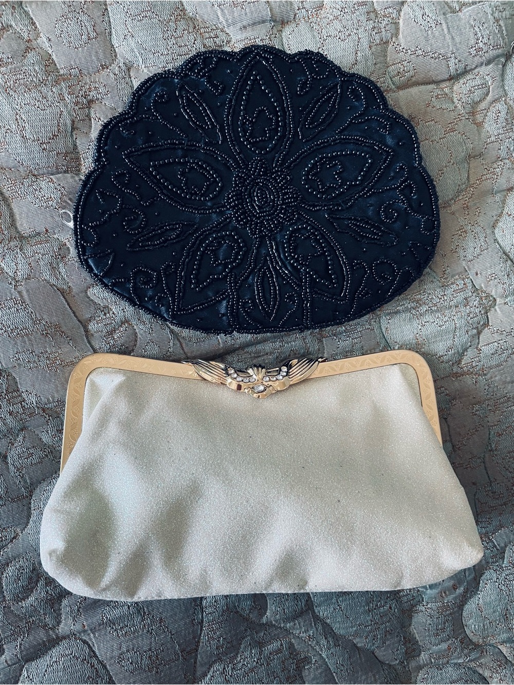 Black Beaded Clutch and a Cream Opalescent Glitter Satin Clutch